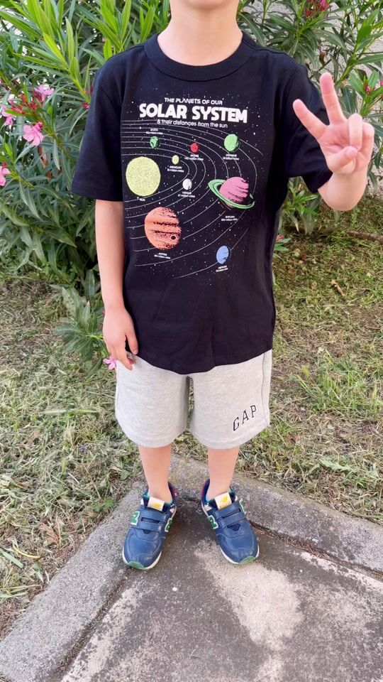 "His favorite shirt with planets ??"