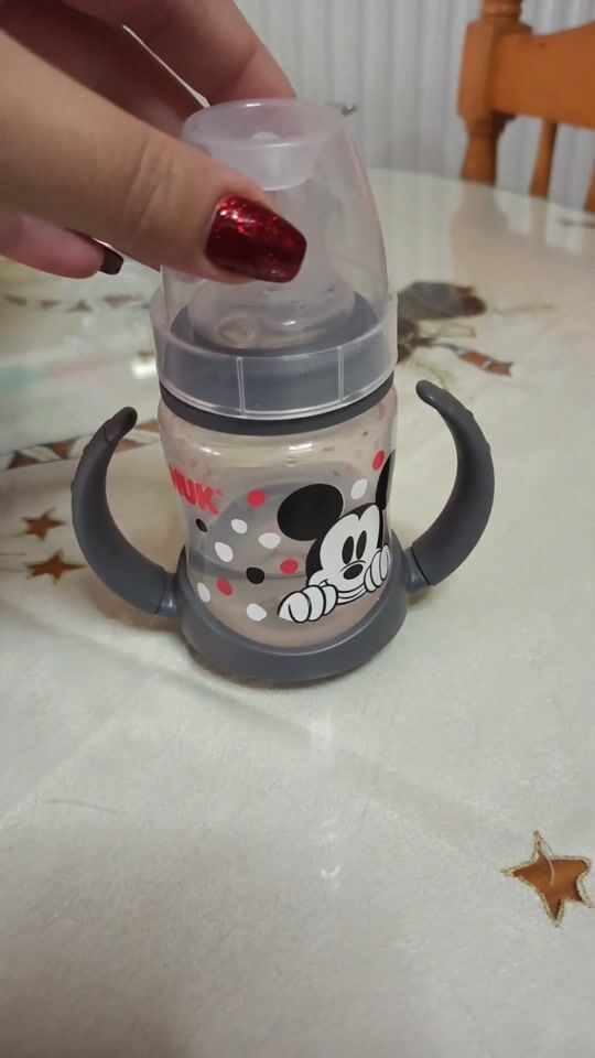 Biberon de antrenament Nuk First Choice Disney Mickey cu mâner 150ml