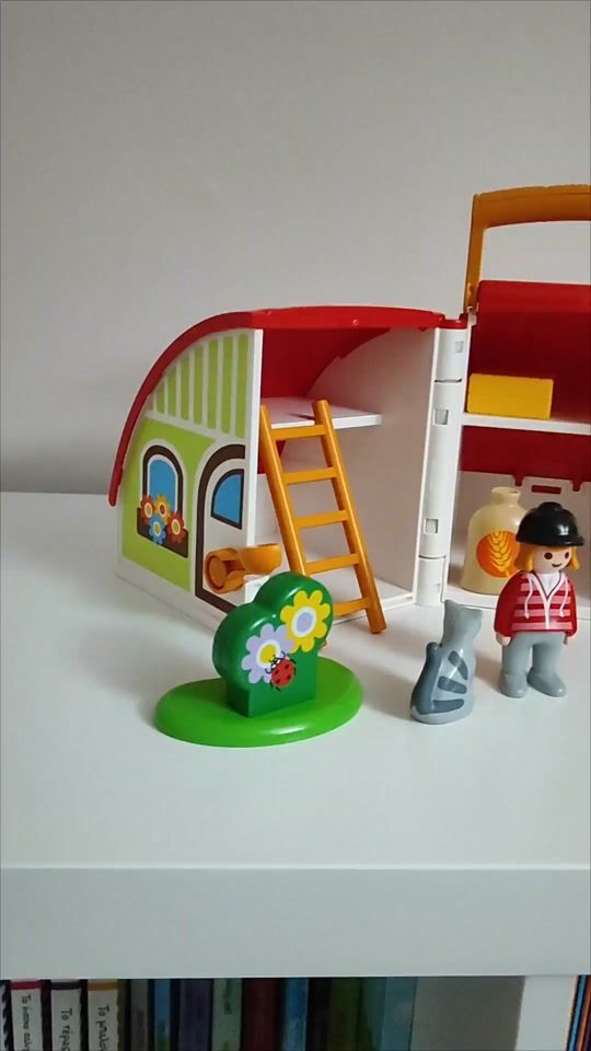 Beautiful small Playmobil farm in a closing suitcase