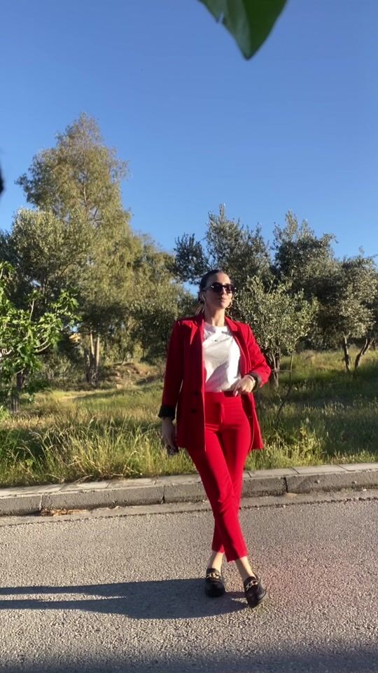 Office look with red suit and loafers ?