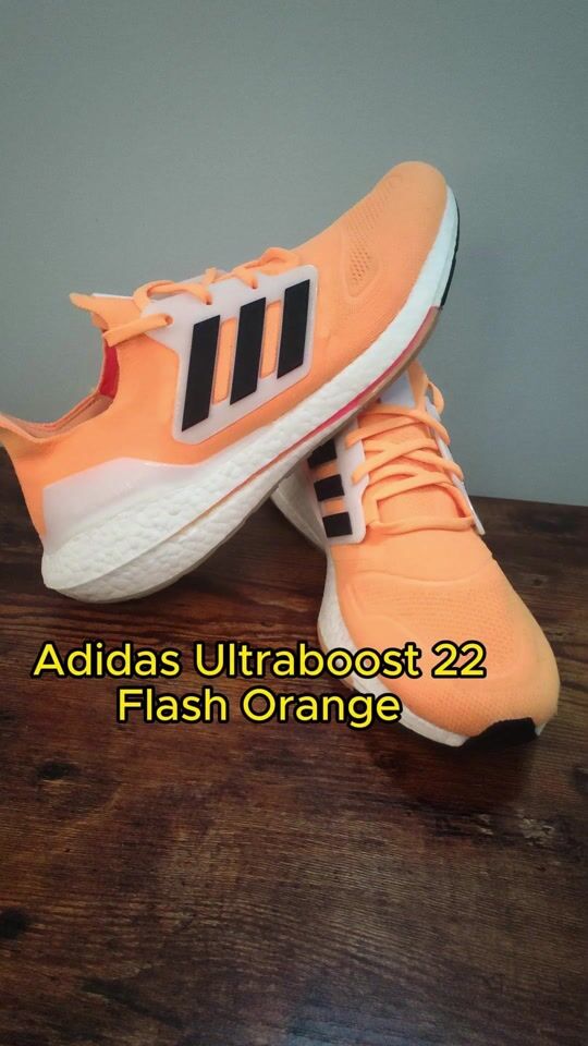 Adidas Ultraboost 22 in Flash Orange color for comfort & style!