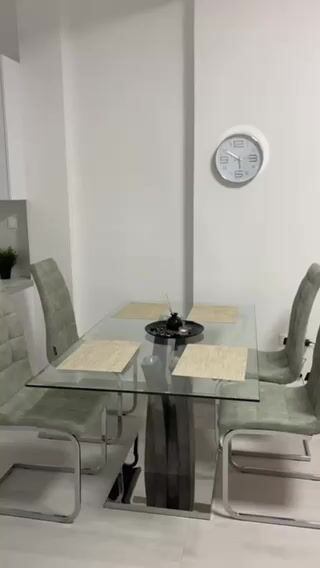 Elegant glass dining set with chairs
